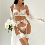 4-teiliges Set aus besticktem Netz-Dessous, bestehend aus Strumpfband, String und Tanga.